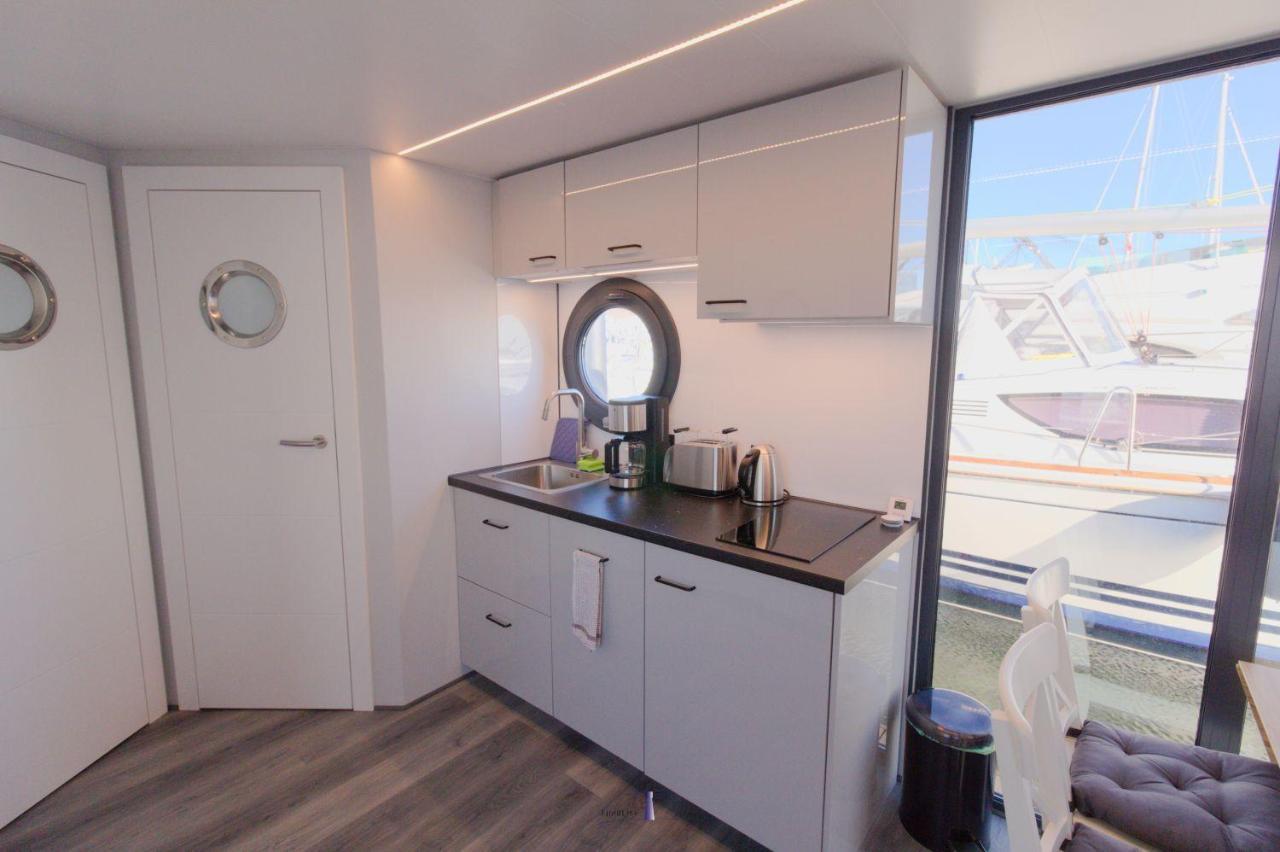Hausboot Fjord Lacerta Mit Dachterrasse In Wendtorf Dış mekan fotoğraf